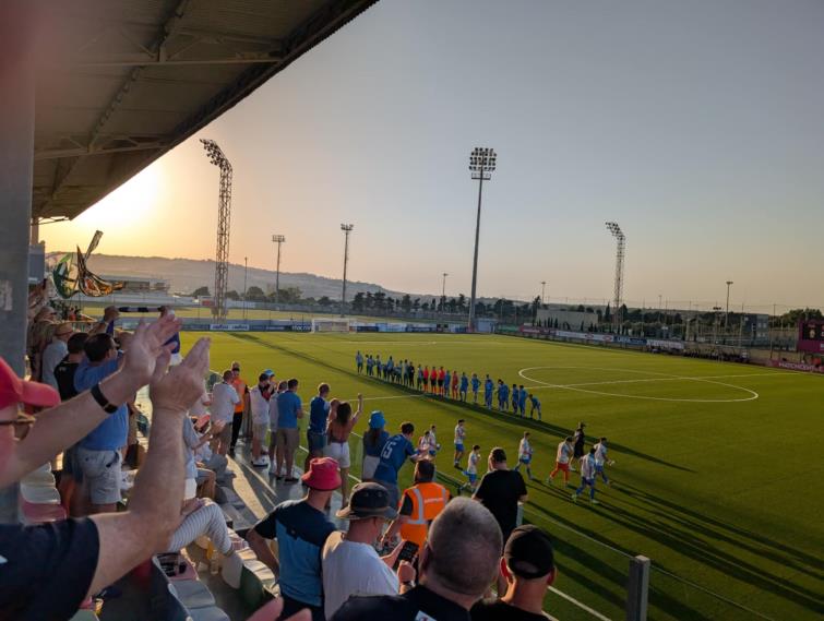 Teams line up before kick off